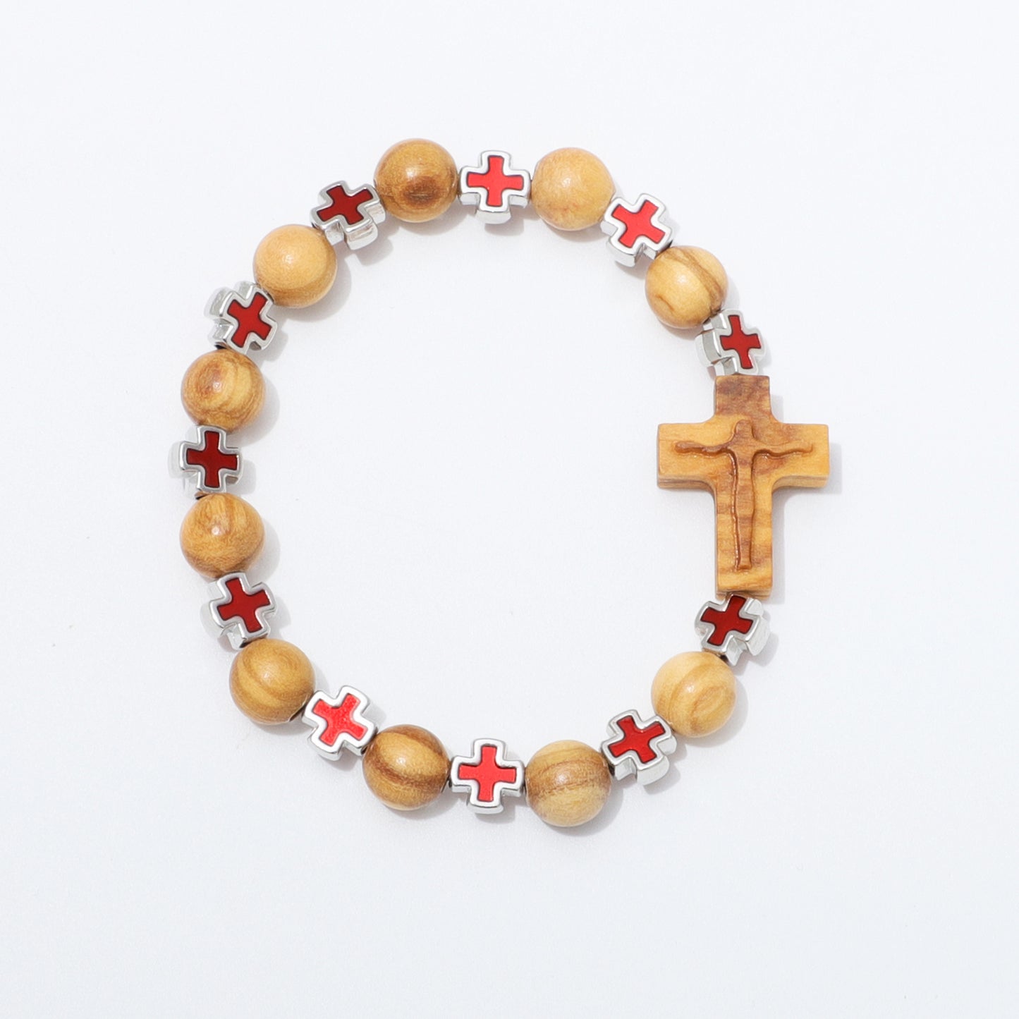 A beaded bracelet featuring light brown wooden beads, red enamel crosses with silver borders, and a matching wooden crucifix, displayed on a clean white background.