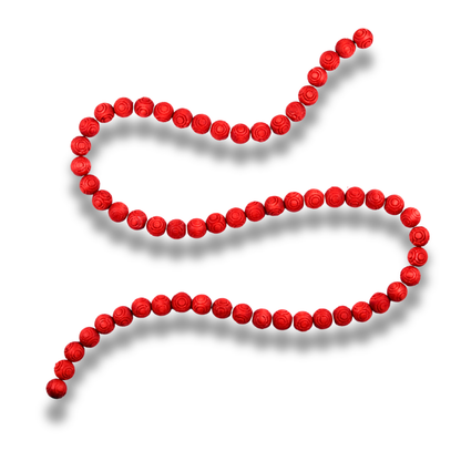 Red beaded necklace on a white background