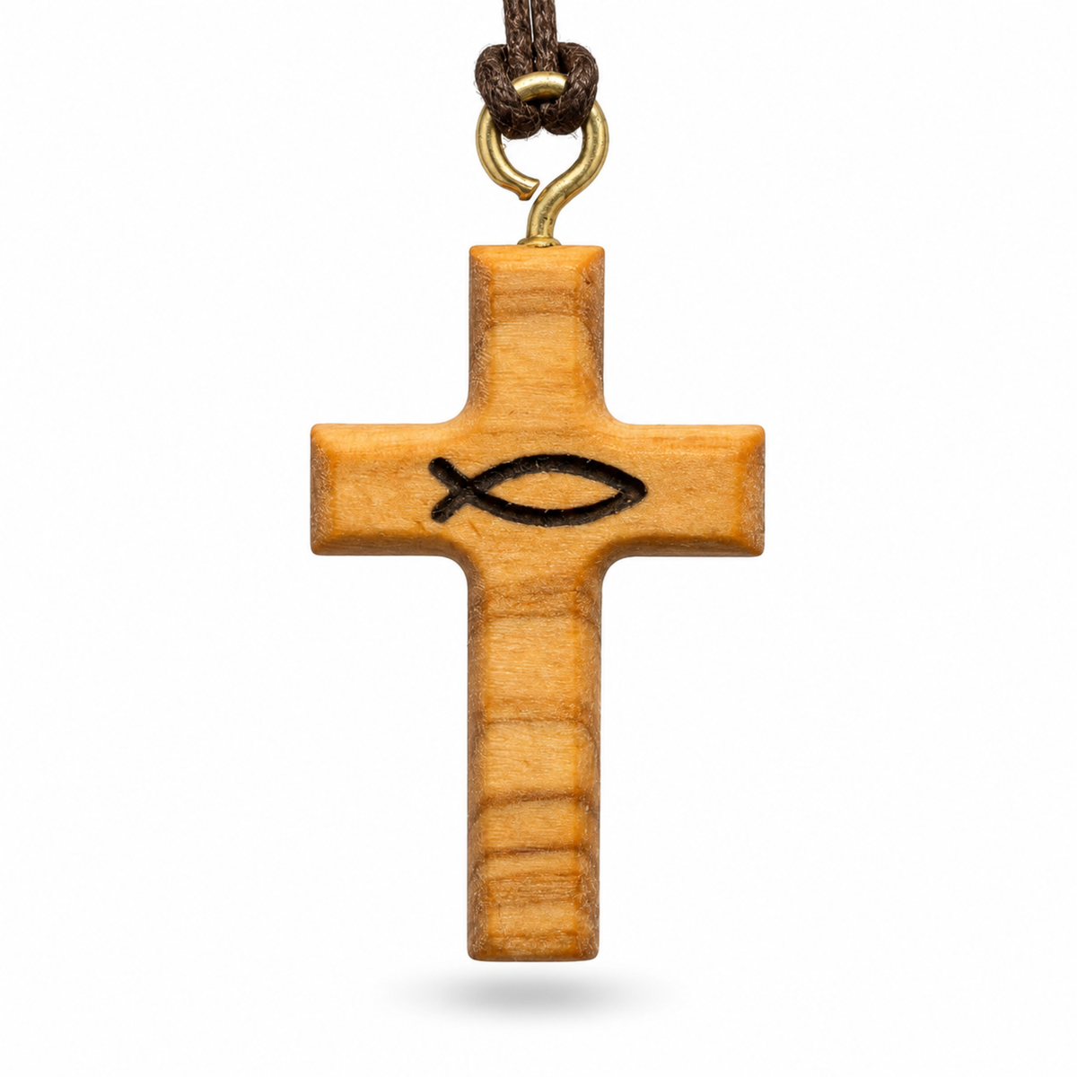 A light natural wood cross pendant featuring a black engraved Christian fish symbol in the center, suspended from a dark brown cord with a gold-colored metal ring, set against a plain white background.