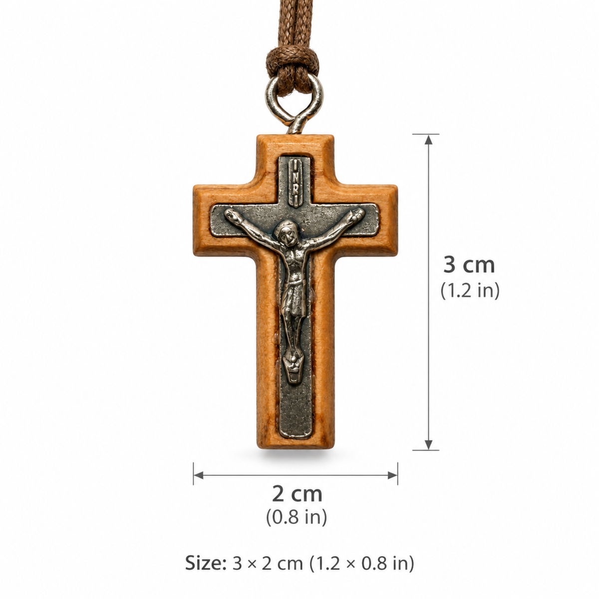 A wooden crucifix pendant with a metal corpus and hanging cord, shown on a white background with dimension labels indicating 3 cm height and 2 cm width.