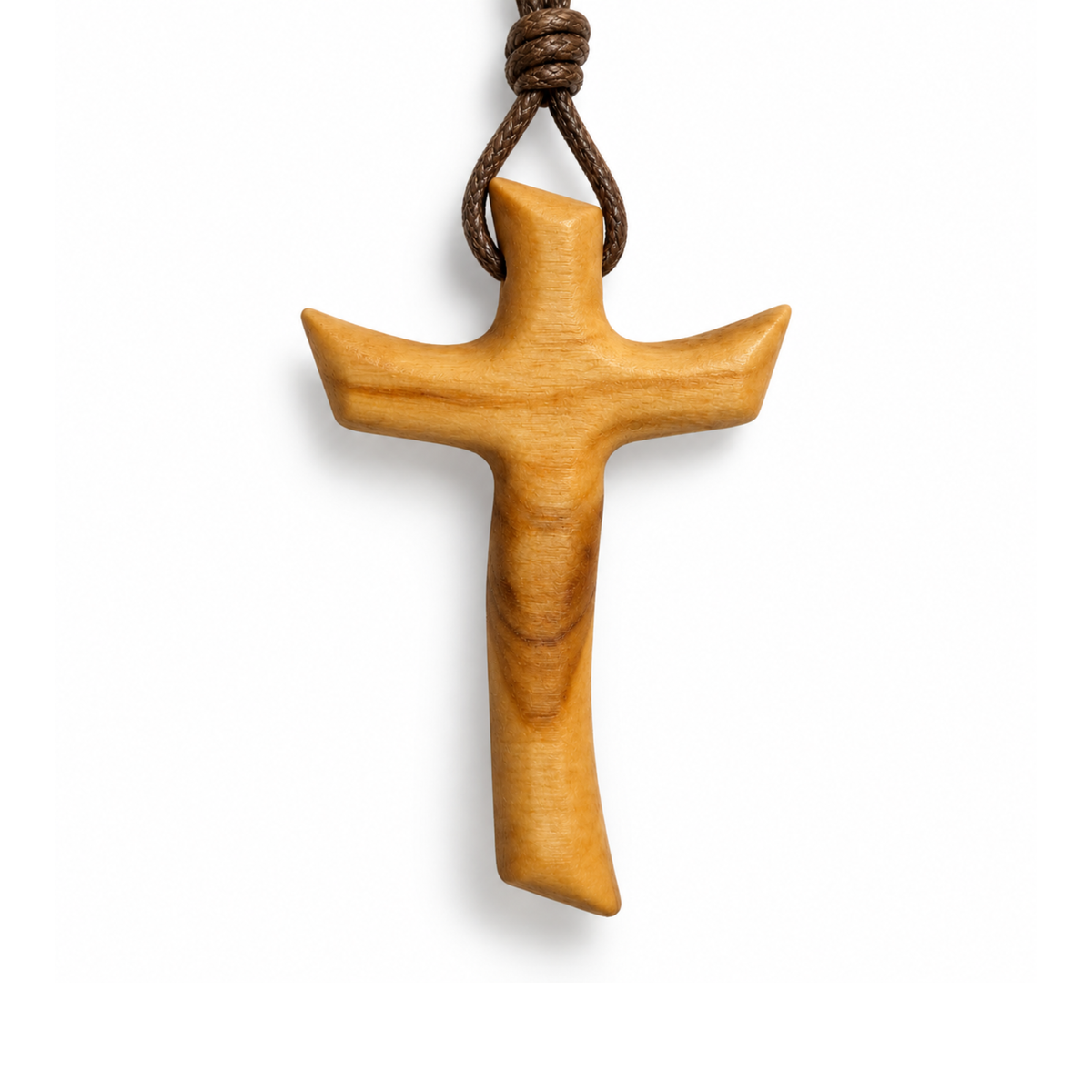 A light brown wooden cross pendant with a natural wood grain finish, suspended from a dark brown knotted cord, shown against a plain white background.