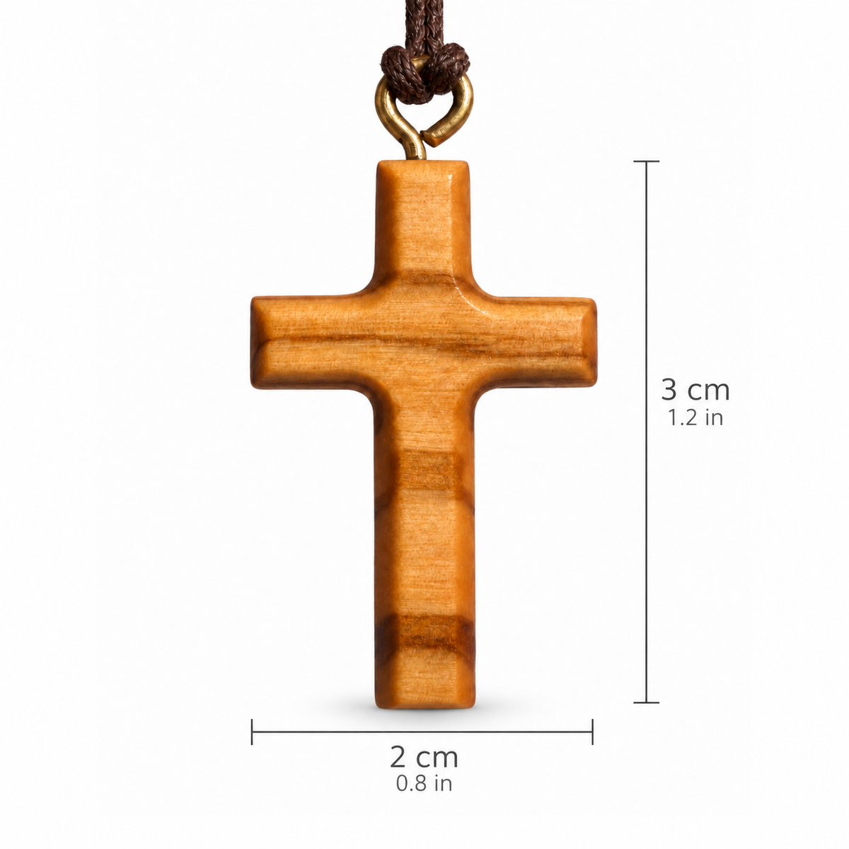 A wooden cross pendant with a brown cord and metal loop, shown on a white background with dimension lines indicating 3 cm height and 2 cm width.