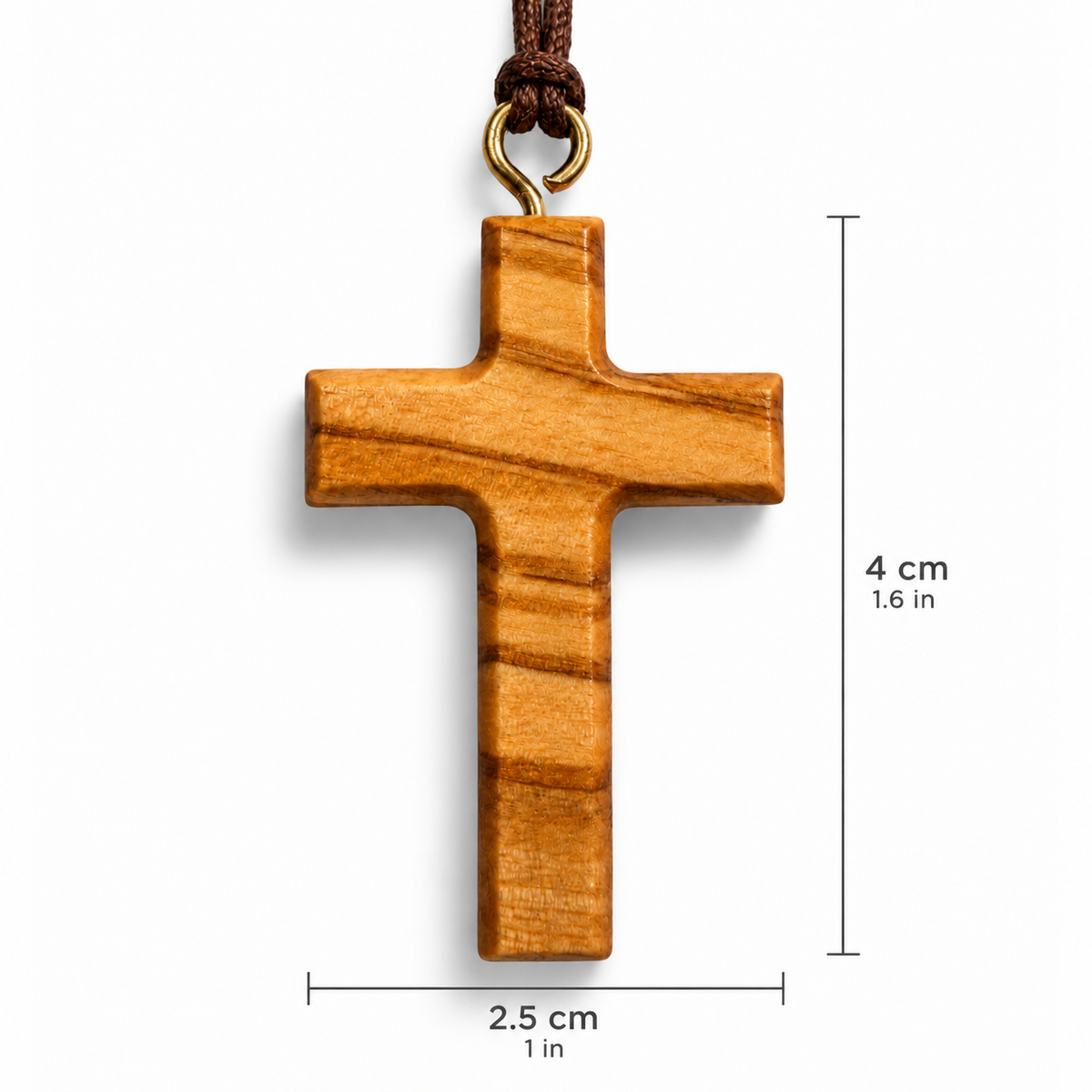 A wooden cross pendant with a natural warm brown finish and a dark brown cord loop with a gold-tone ring, shown on a white background with dimension lines indicating 4 cm height and 2.5 cm width.