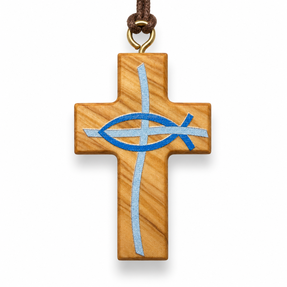 A wooden cross pendant with a blue and silver embroidered Ichthys symbol, hanging from a brown cord with a gold-colored metal ring, shown against a plain white background.