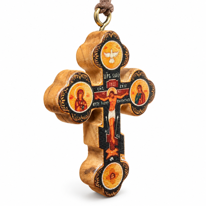 A wooden Orthodox Christian cross ornament featuring hand-painted religious iconography, including depictions of the Divine Mercy, the Virgin Mary, and Jesus Christ on the cross, with a hanging loop at the top.