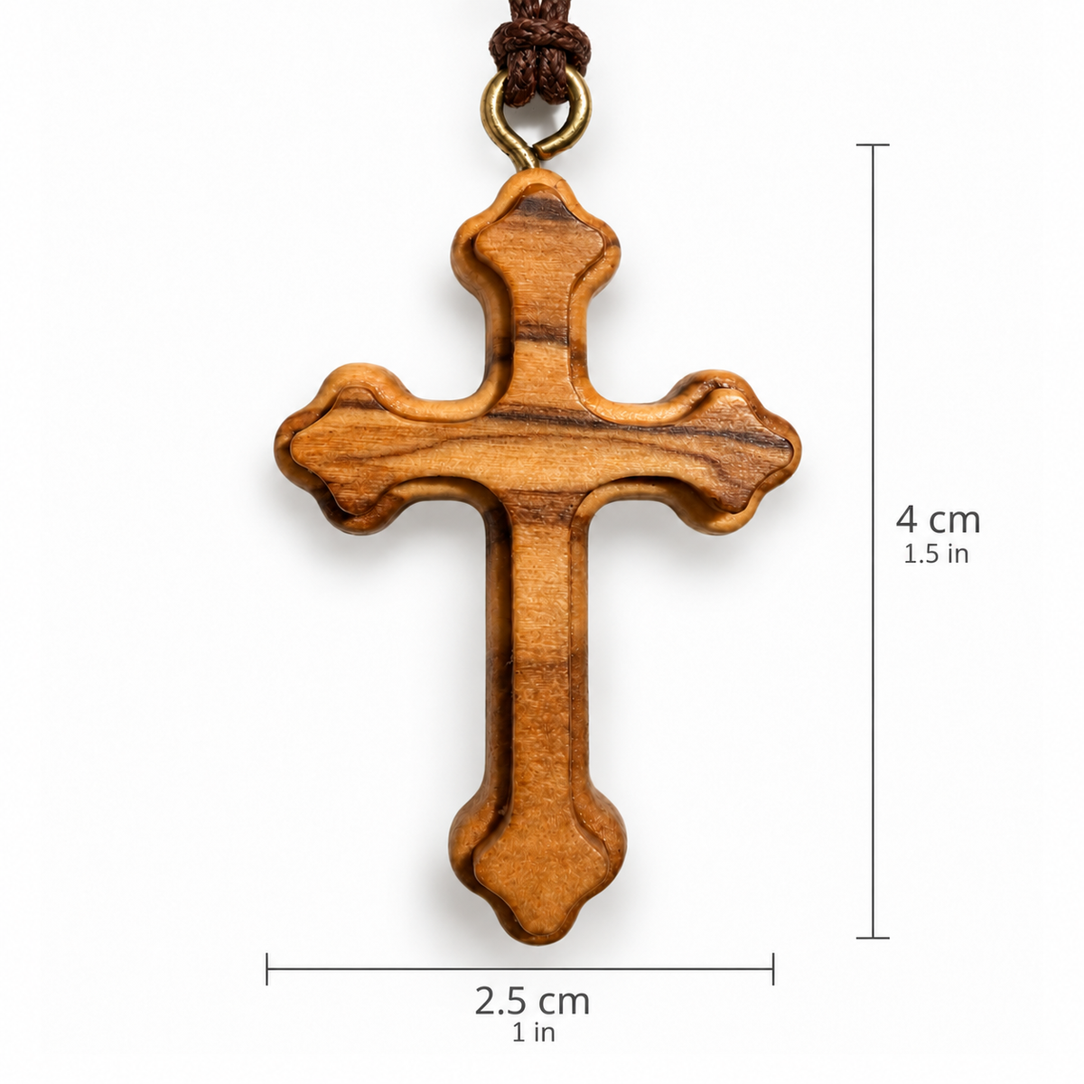 A wooden Orthodox cross pendant with a natural grain pattern, hanging from a dark brown cord with a brass ring. The image includes dimension overlays showing the height as 4 cm (1.