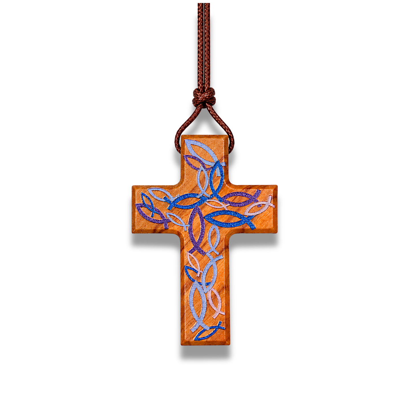 Handcrafted olive wood cross necklace featuring intricate blue and violet Ichthus fish engravings forming a woven pattern on the surface, suspended on a brown cord.