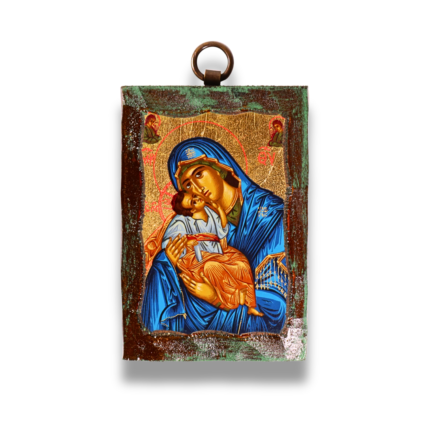 An icon of the Virgin Mary in a blue robe holding the child Jesus, with both figures haloed against a gold leaf background. Above them are two angels, and the icon is bordered by a dark, textured frame with a metal loop at the top for hanging.
