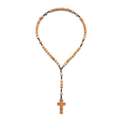 Wooden rosary with a cross pendant on a white background