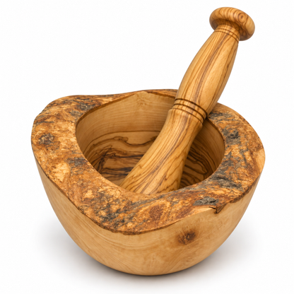 A wooden mortar and pestle set with a natural olive wood grain pattern, featuring a burl-patterned outer rim and a smooth inner bowl, shown on a white background.