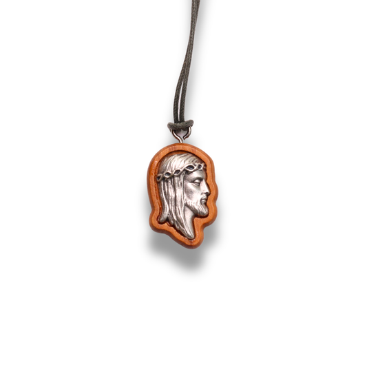 Visage of Jesus Olive Wood Necklace close up on a white background