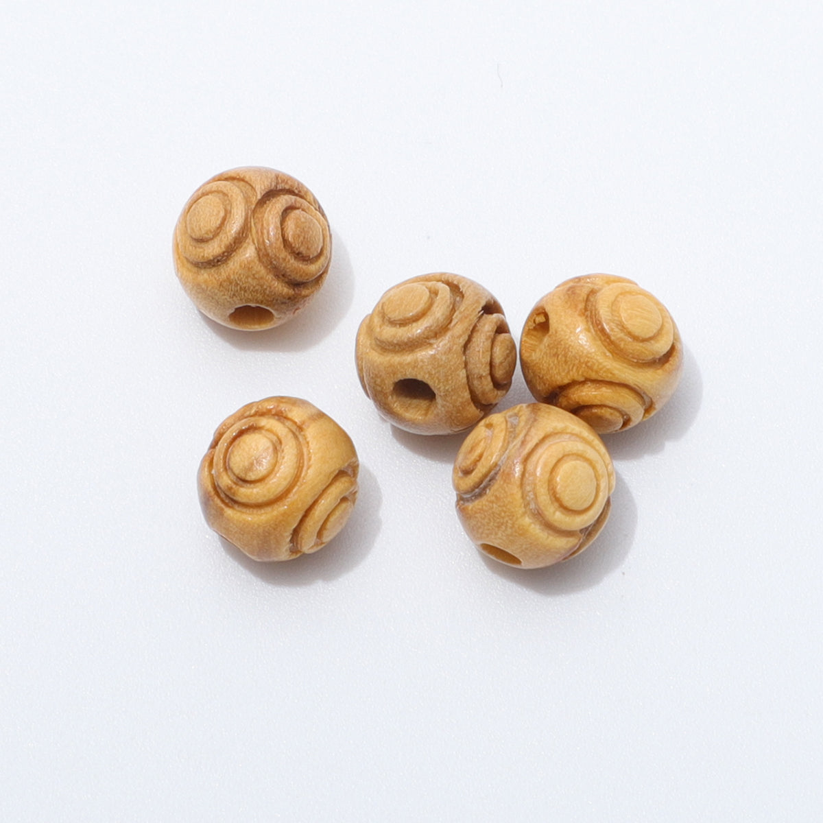 Engraved olive wood beads - 8mm