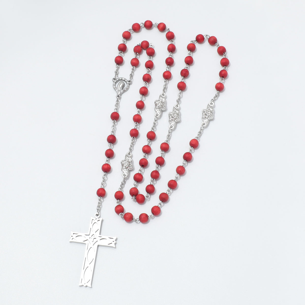 Close-up of Ichthus fish cross on Maria rose scented rosary