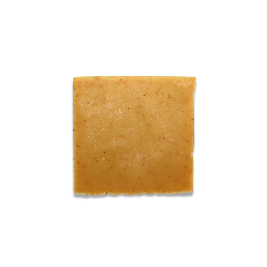 Square piece of soap bar on a white background