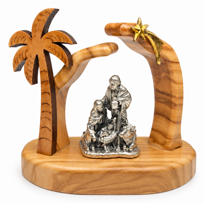 Small olive wood nativity scene with Holy Family, palm tree and gold-colored star, front view