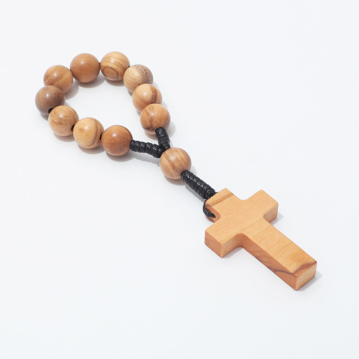 Angled full view of a 10mm olive wood rosary with plain cross and black knotted cord