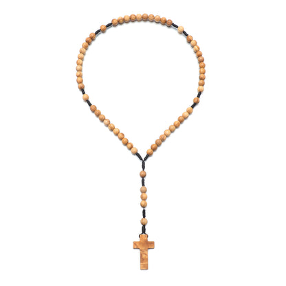 Wooden rosary necklace with a cross on a white background