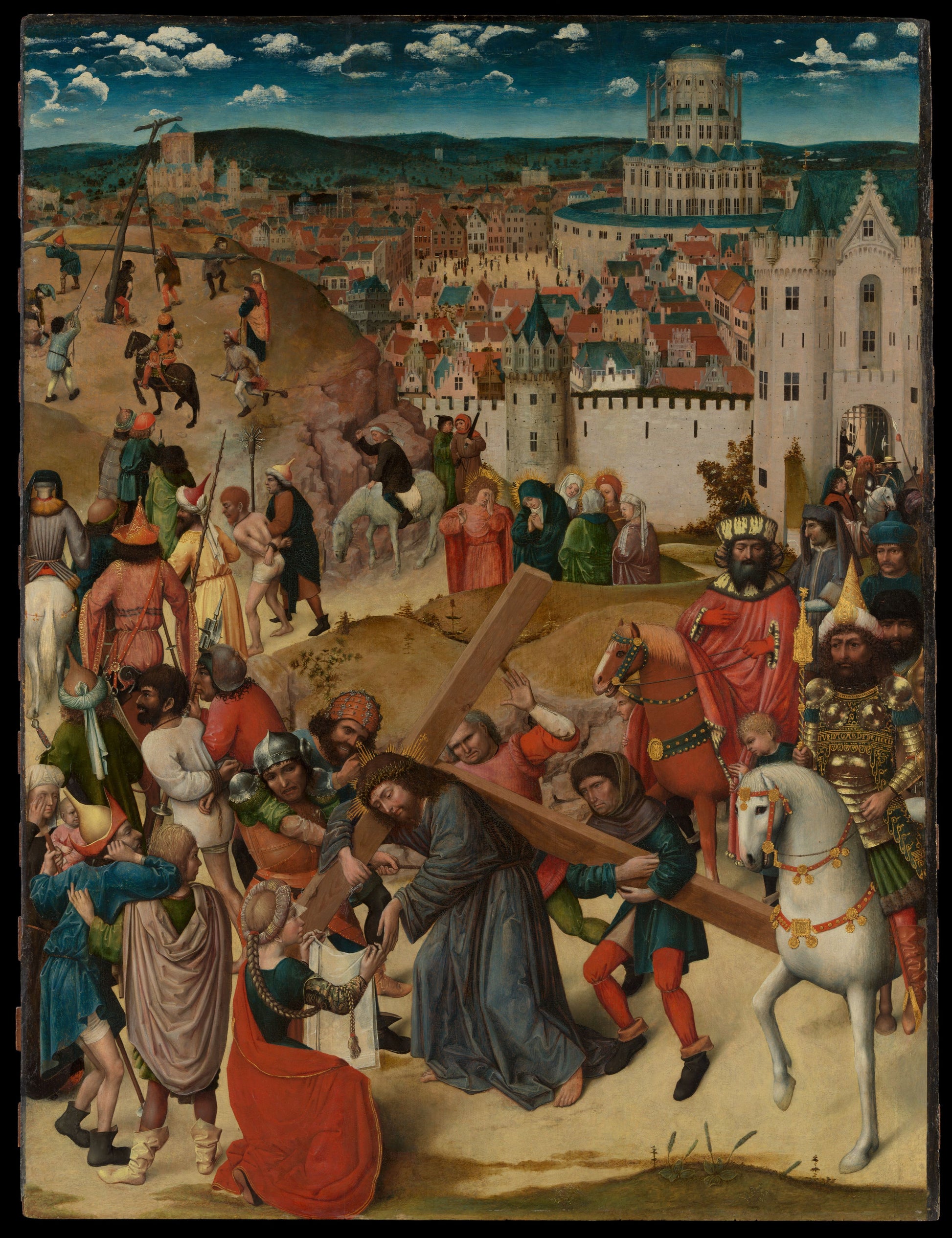 A medieval-style religious painting showing a crowd carrying a wooden cross toward a city, with a white horse, figures in colorful robes, and a fortified town under a blue sky.