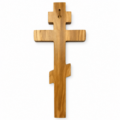 Back of a Russian Orthodox olive wood wall cross, showing the recessed keyhole slot for wall hanging.